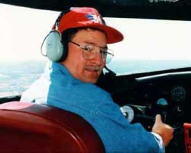 Me at the controls of the Aluminum Overcast